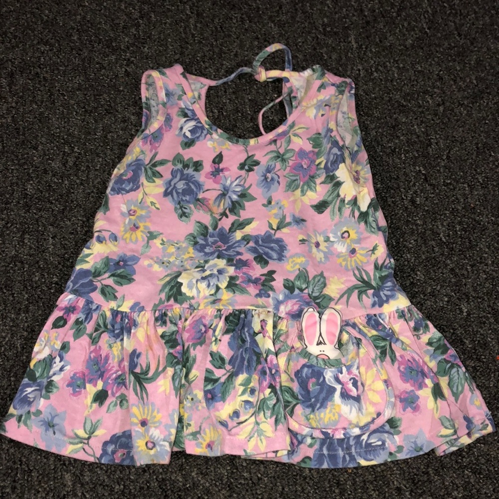 Sun dress with bunny toy in pocket